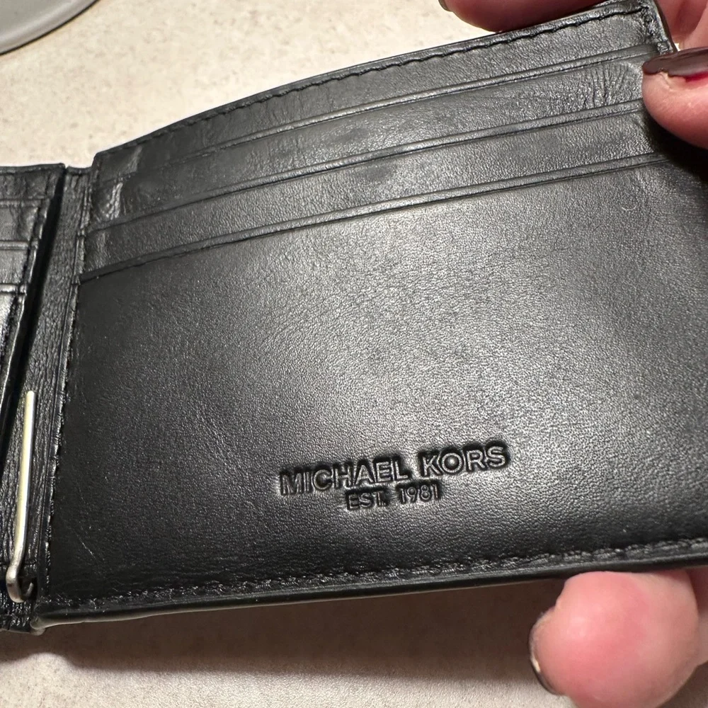 Michael Kors Cooper bilfold bifold wallet. Black and white. Used, mild wear